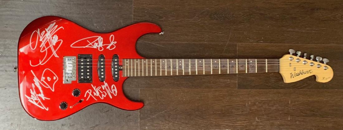 Signed Kiss Guitar: Signed by Gene Simmons, Paul Stanley, Ace Frehley, and Peter Criss