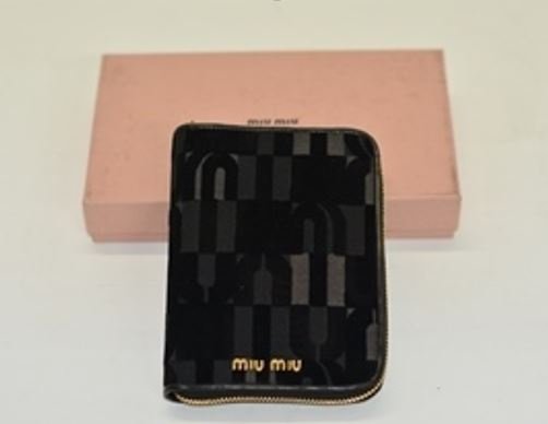 New Miu Miu Agenda with zipper: Miu Miu New!Style: Ladies Agenda with zipperST.COCCO LUXColor: blackMade in Italy100% authentic. Imported new from Italy.