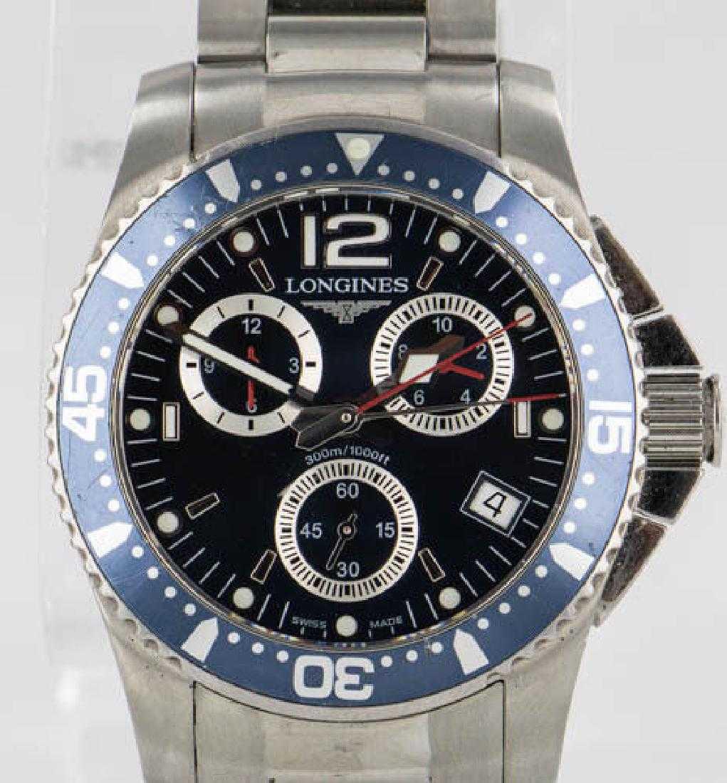 Longines Hydro Conquest Watch: Brand:Longines Model:Longines HydroConquest Extra Links:No Band Color:Silver Face Color:Blue Band Material:Stainless Steel Features:Sapphire Crystal Band Type:Bracelet/Link Band Gender:Men's Caseback: