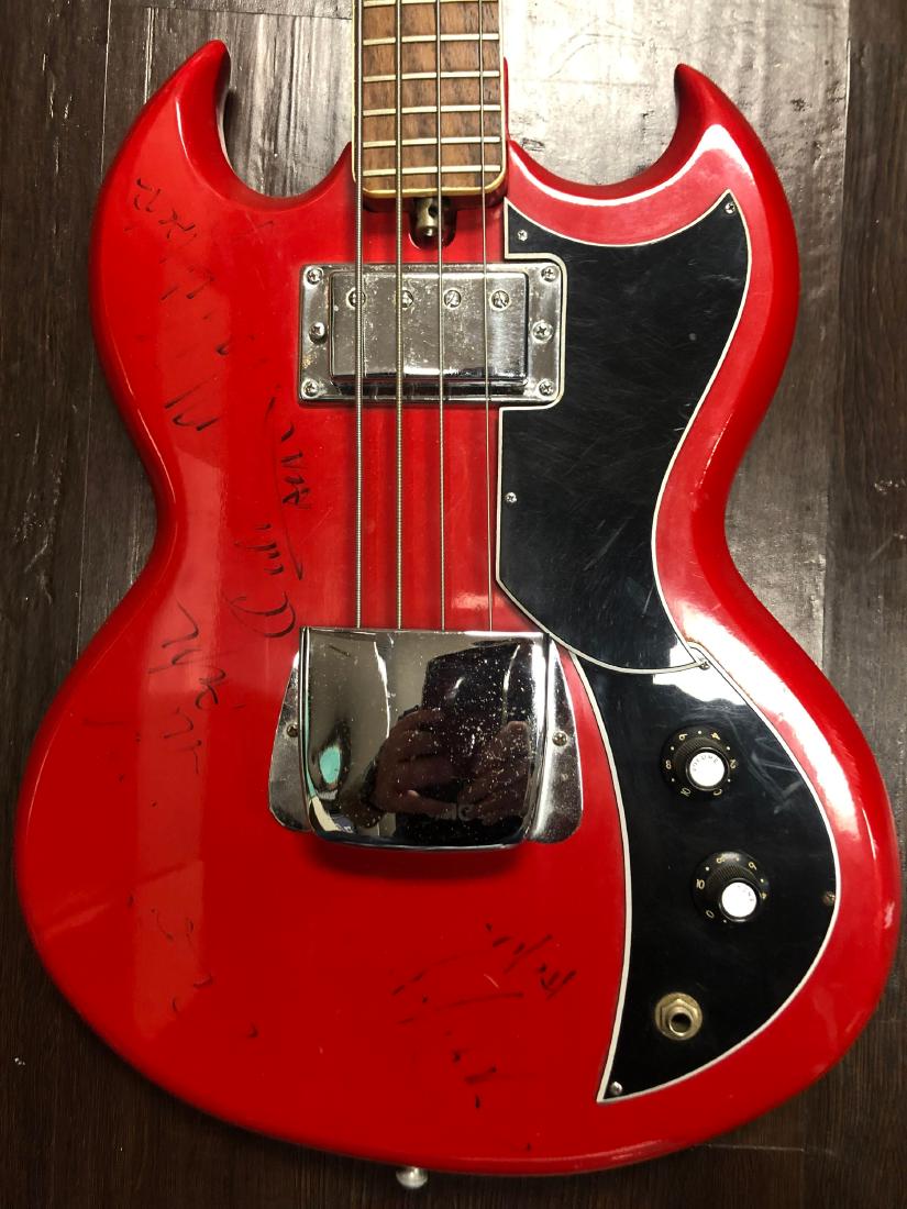 Signed AC/DC Guitar: Signed by Bon Scott, Angus Young, Malcolm Young, Cliff Williams, and Phil Rudd. PLEASE NOTE THESE SIGNATURE ARE FADED AND A LITTLE SMUUDGED. PLEASE LOOK AT THE PHOTOS CAREFULLY AS THIS ITEM IS SOLD AS