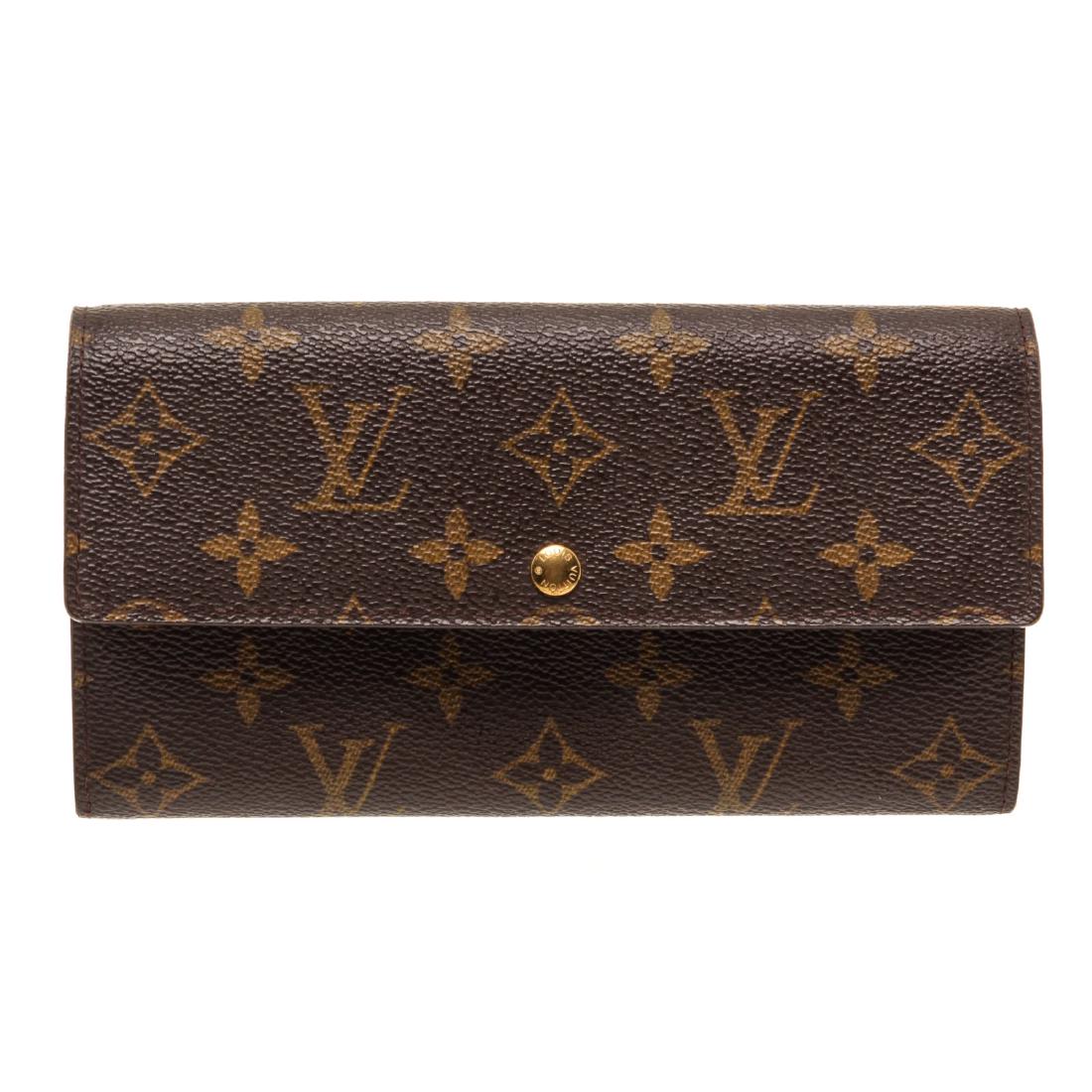 Louis Vuitton Monogram Canvas Leather Sarah Wallet: Brand:Louis Vuitton Style:Monogram Canvas Leather Sarah Wallet Description:Brown and tan monogram coated canvas Louis Vuitton Sarah Wallet with brass hardware, four card slots at front flap underside,