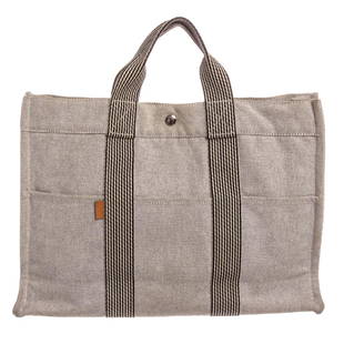 Hermes Light Gray Canvas Fourre Tout MM Tote Bag: Brand:Hermes Style:Light Gray Canvas Fourre Tout MM Tote Bag Description:Light gray canvas HermÃ¨s Fourre Tout MM with palladium-plated hardware, tonal canvas trim, dual flat top handles, six exteri