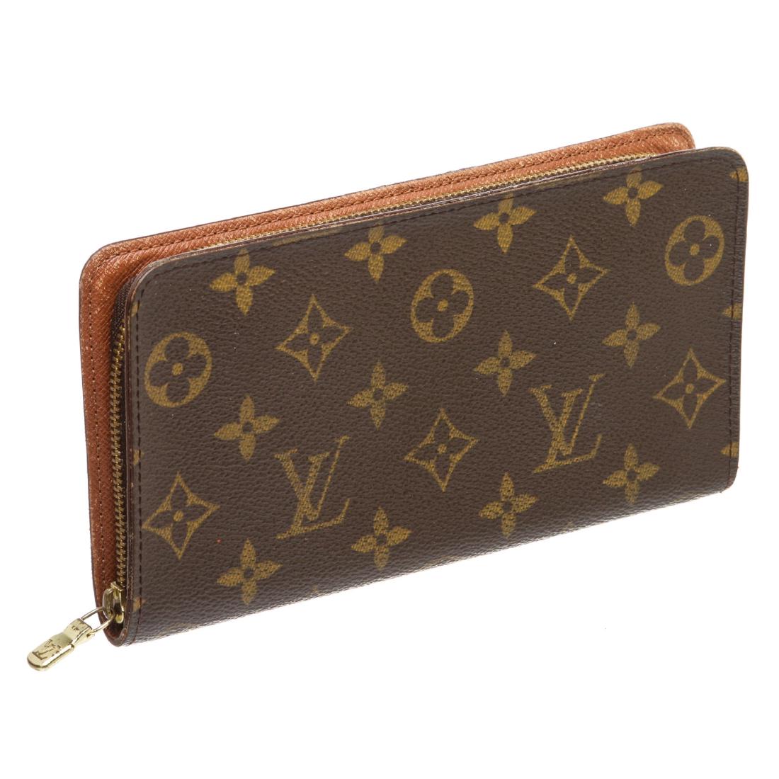 Louis Vuitton Monogram Canvas Leather Zippy Wallet: Brand:Louis Vuitton Style:Monogram Canvas Leather Zippy Wallet Description:Brown and tan monogram coated canvas Louis Vuitton Zippy wallet with brass hardware, eight card slots and three bill compartm