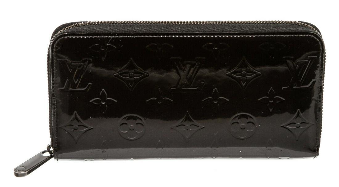 Louis Vuitton Noir Vernis Zippy Wallet: Brand: Louis Vuitton Style: Noir Vernis Zippy Wallet Description: Noir Vernis leather Louis Vuitton zippy wallet that features ruthenium hardware, six bill compartments, eight card slots and a middle