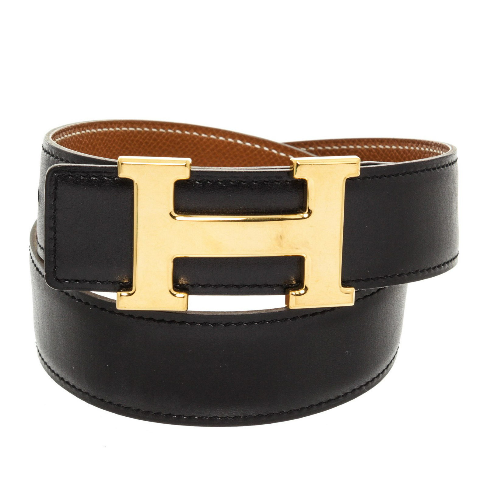 Hermes Leather Belt: Brand: Hermes Style: Hermes Black Leather Reversible Constance H Belt 65 Description: Black and tan leather HermÃ¨s Reversible Constance belt with gold plated H buckle featuring peg-in-hole closures
