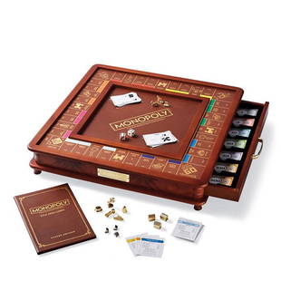 MONOPOLY Luxury Edition Board Game - Played Once!: MONOPOLY by Parker Bros., one of the most enjoyed board games in the history of board games! Beautiful 2-tone wood cabinet with gold-tone metal accents. Recessed dice rolling are. Foil-stamped gamepat