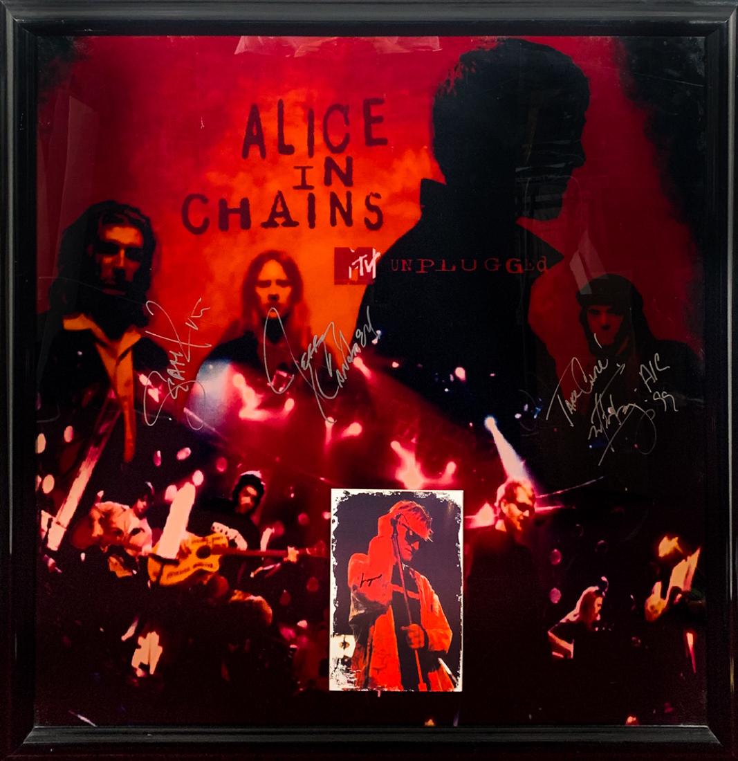 "ALICE in CHAINS" Band Signed Poster, Framed w/Staley: "Alice in Chains: Unplugged" poster signed by Jerry Cantrell, Sean Kinney and Mike Inez custom framed with inset 7"x10" color photo signed by late frontman Layne Staley (1967-2002).