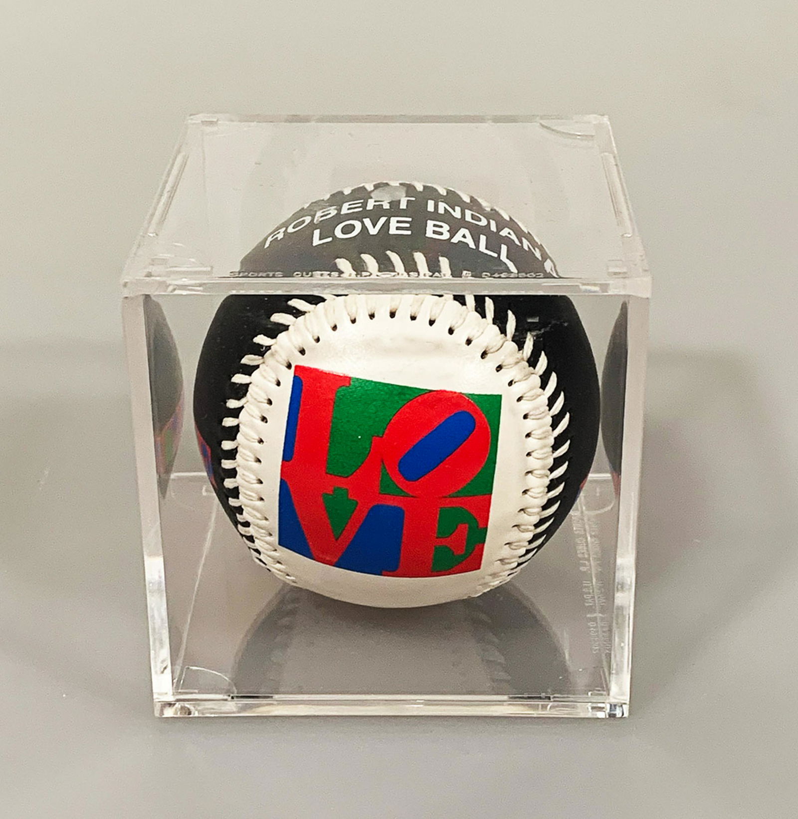 ROBERT INDIANA 'LOVE Ball' Collectible Baseball: 'LOVE' Collectible Baseball by Robert Indiana, 2013 3 Inches diameter Based on the artists famous 'LOVE' sculpture from 1964. Comes with protective BallQube. ABOUT THE ITEM The origin