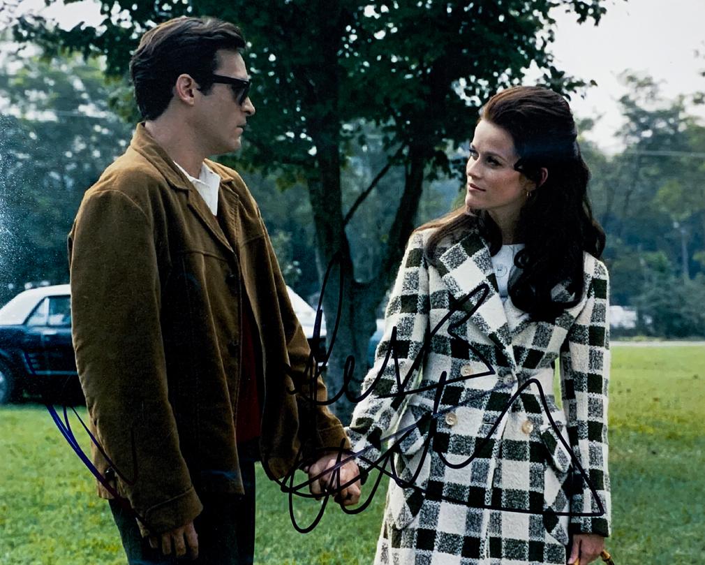 "WALK the LINE" Phoenix/Witherspoon Signed 8x10 Photo: "Walk The Line" was nominated for 5 Oscars at the 78th Academy Awards, including Best Actor (Phoenix) and Best Actress (Witherspoon, which she won). This is a rare, in-person signed color 8x10 photo a