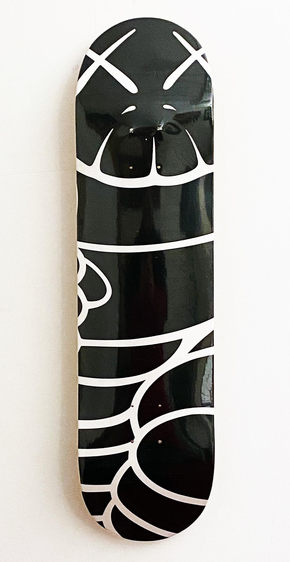 supreme x kaws skateboard