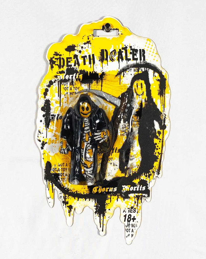 RYCA 'Death Dealer' (Not-A-Toy) Carded Action Figure: 'Death Dealer' by Ryan Callanan aka RYCA, 2019 4 Inches tall 7" x 12" x 2" (blister-pack) Original cast resin action figure in artist-made, carded blister-pack. Limited Edition of 30 (#17/30) Signed a