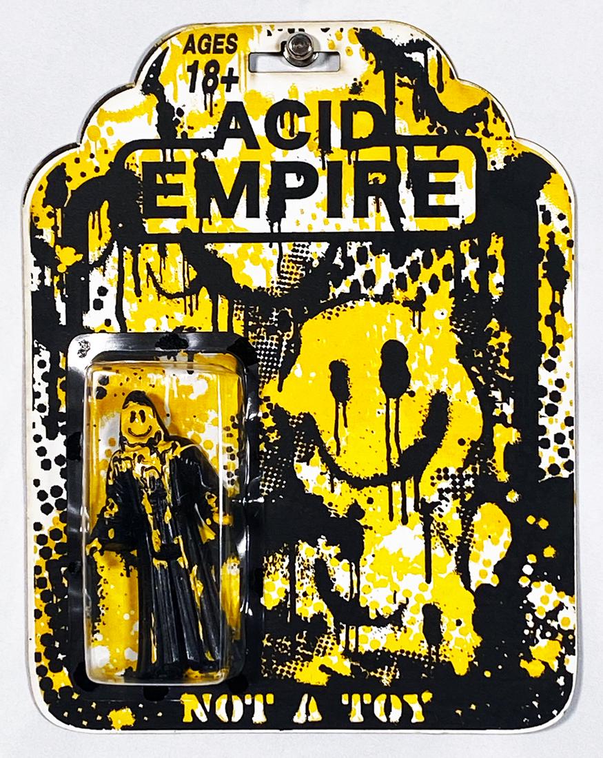 RYCA 'Acid Empire' (Not-A-Toy) Carded Action Figure: 'Acid Empire' by Ryan Callanan aka RYCA, 2014 4 Inches tall (figure) 7" x 9" x 1.25" (blister-pack) Original cast resin action figure in artist-made carded blister-pack. Limited Edition of 180 (#35/18