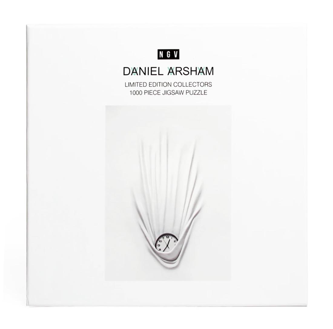 DANIEL ARSHAM 'Falling Clock' Limited 1000pc Puzzle: 'Falling Clock' by Daniel Arsham, 2020 Based on the artist's original work from 2018. Collab. with Perrotin Gallery x NGV Triennial. 19.75 x 27.5 Inches (puzzle) 11.2 x 15.75 Inches (incl. print) 9.5