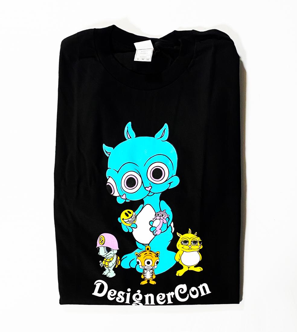 RON ENGLISH 'Ronnie Rabbit' (DesignerCon 2019) T-Shirt: 'Ronnie Rabbit' by Ron English, 2019 DesignerCon 2019 Exclusive. Size: XL Color: Black 100% Cotton with screen printed graphics. Open Edition (Sold Out). New in shipping bag. ARTIST BIO R