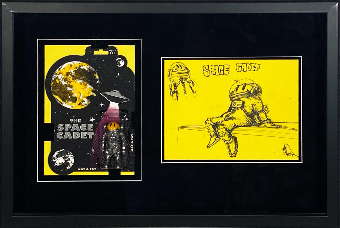 RYCA 'Space Cadet' Framed Action Figure + Original: 'Space Cadet' by RYCA aka Ryan Callanan, 2014-2020 17.5 x 26 x 2 Inches (framed) Original 4 inch cast resin action figure in artist-made carded blister-pack AND... Hand-drawn 'Space Cadet' sketch on c