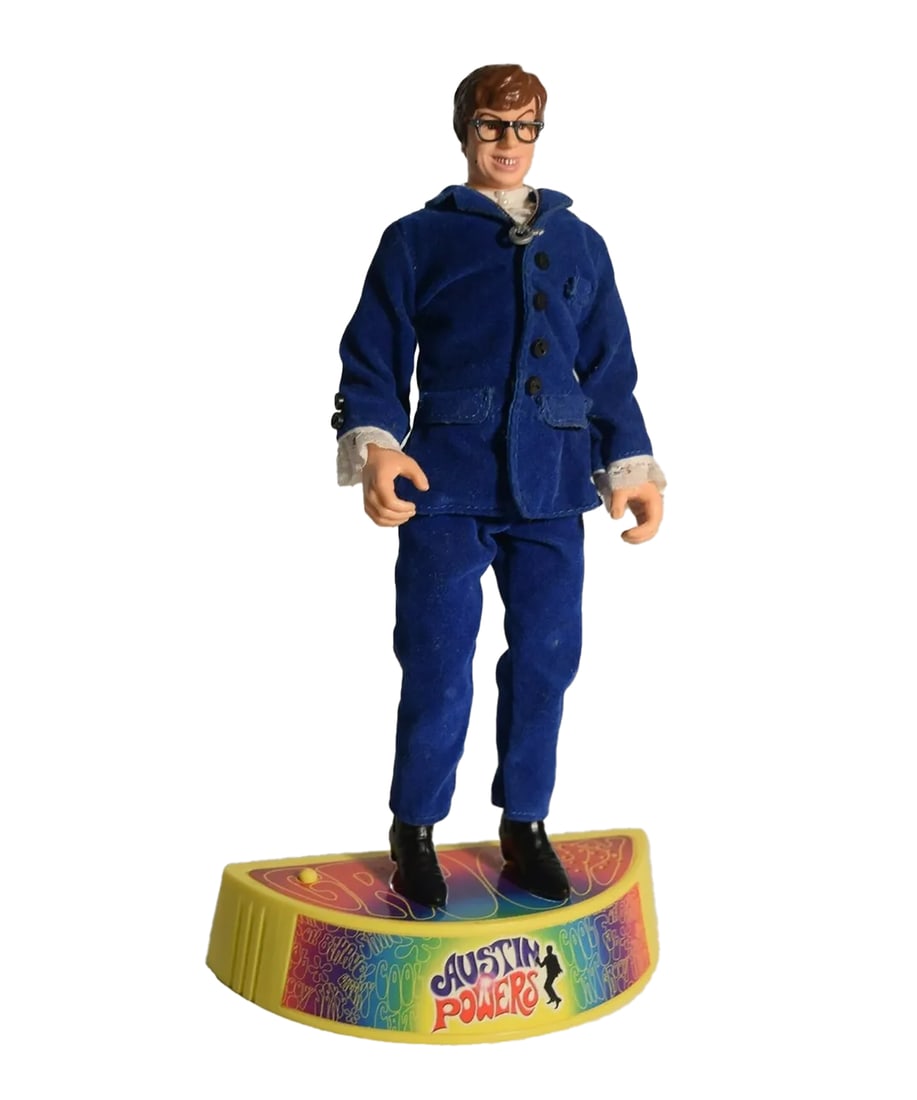 AUSTIN POWERS x Trendmasters(1998) Collectible Figure: 'Austin Powers' x TrendMasters, 1998 Collectible figure from the blockbuster comedy. Officially licensed by New Line Productions, Inc. 9.5 Inches tall 24.1 Centimeters tall 12 x 6 x 3 Inches (box) Ful