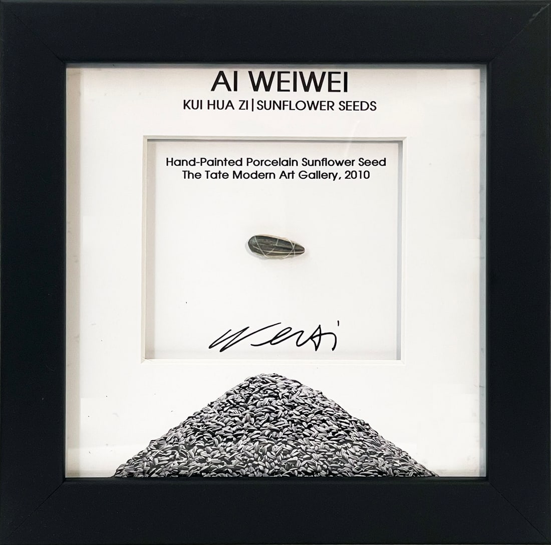 AI WEIWEI 'Sunflower Seed' (2010) Custom Framed Hand-Painted Seed Sculpture: 'Sunflower Seed' by Ai Weiwei, 2010 0.75 x .025 Inches each 1.9 x 0.7 Centimeters each 9 x 9 x 1 Inches (framed) Hand-painted porcelain sunflower seed from the artist's historic exhibit. Unique, limi