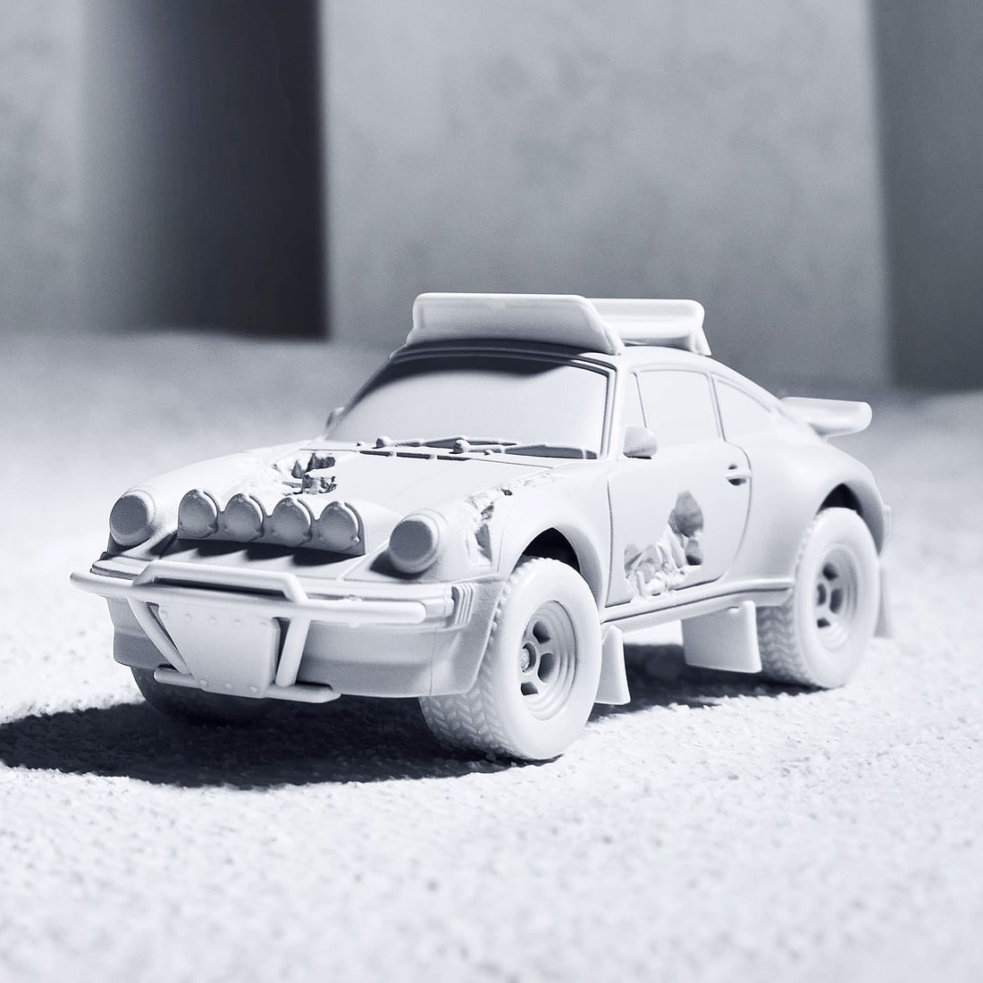 DANIEL ARSHAM x Hot Wheels 'Eroded Porsche Safari' (2024) 1:64 Scale Car + Display: 'Eroded Porsche Safari' by Hot Wheels, 2024 Limited Edition collectors car collab. by artist Daniel Arsham x Mattel Creations. Based on Arsham's own 1986 Porsche design and subsequent eroded sculpture