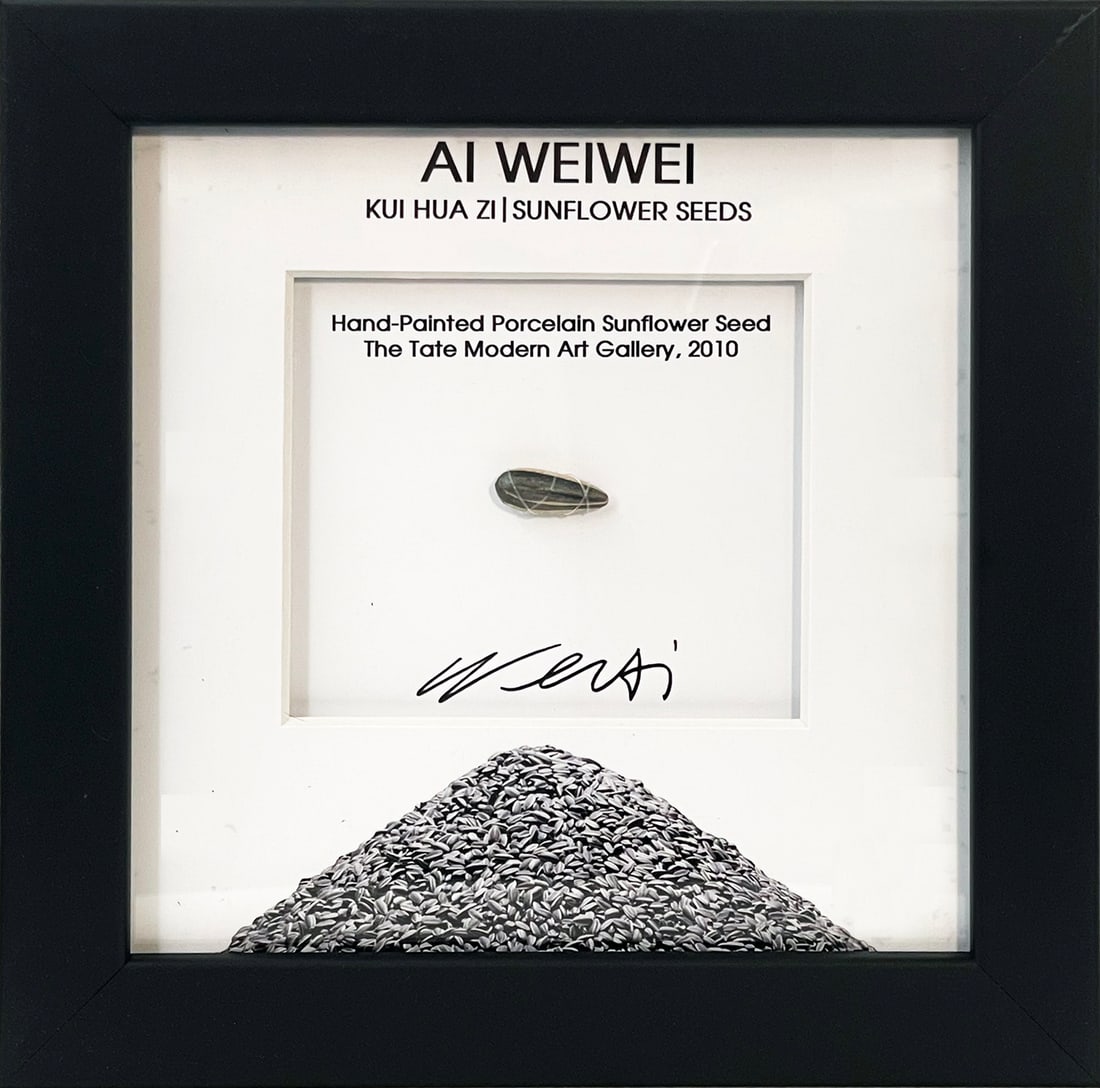 AI WEIWEI 'Sunflower Seed' (2010) LE (AP) Hand-Painted + Framed Mini-Sculpture: 'Sunflower Seed' by Ai Weiwei, 2010 Limited Edition custom framed presentation by Signari Gallery, 2021. 0.75 x .025 Inches each 1.9 x 0.7 Centimeters each 9 x 9 x 1 Inches (framed) Hand-painted porc