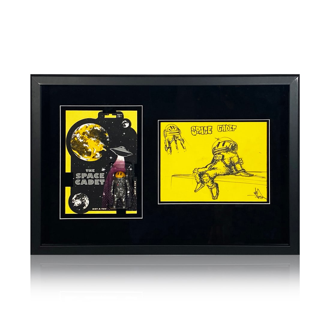 RYCA 'Space Cadet' (2014/2020) Framed Original Sketch/Action Figure Set: 'Space Cadet' by RYCA aka Ryan Callanan, 2014-2020. Rare custom framed presentation with original, hand-drawn sketch. 8 x 10.5 Inches/20.3 x 26.7 Centimeters (sketch) 4 Inches/10.2