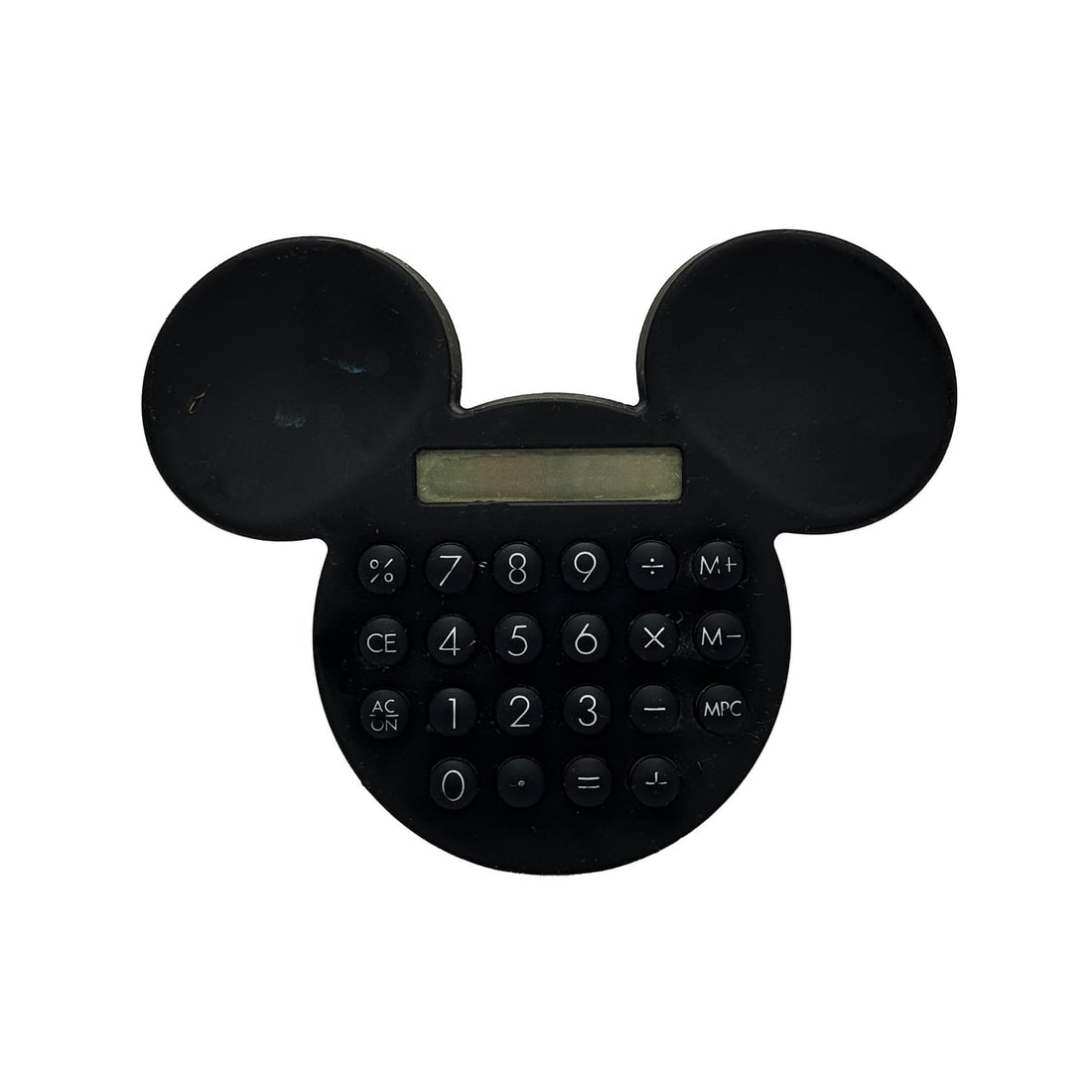 DISNEY 'Mickey Mouse' (1990-2000) Digital Calculator: 'Mickey Mouse Digital Calculator' by Disney, 1990-2000 4 x 5 x 1 Inches Mickey Mouse head shaped novelty calculator. Hard black plastic (matte finish) with small, horizontal LCD screen between the ear