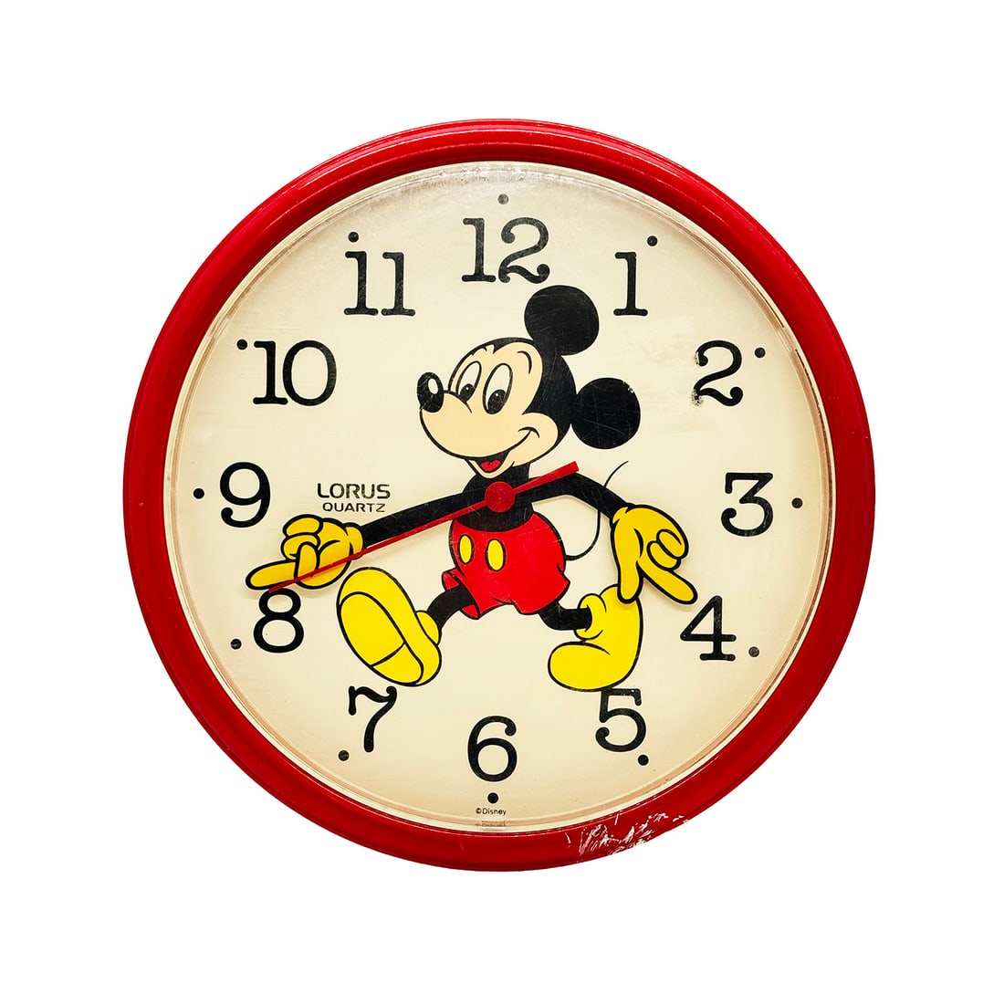 DISNEY 'Mickey Mouse by Lorus' (1992-1994) Vintage Wall Clock: 'Mickey Mouse Wall Clock' by Lorus, 1992-1994 9.75 x 9.75 x 2 Inches Rare, vintage Mickey Mouse wall clock. Features a classic Mickey Mouse in his red shorts and yellow shoes. Retro-style black numera