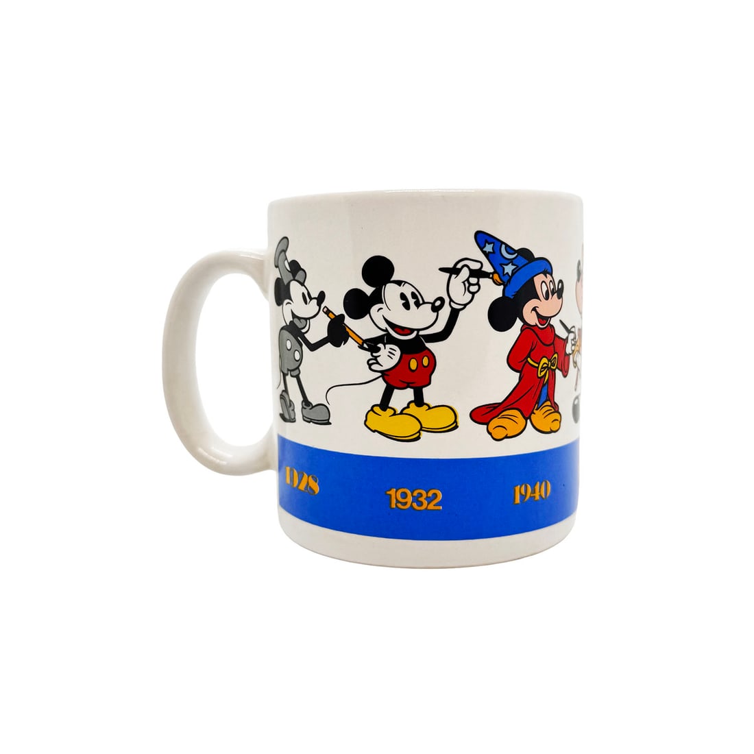 DISNEY 'Mickey: Thru the Years' (1990) Collectible Coffee Mug: 'Mickey: Thru the Years Mug' by Disney, 1990 3.5 x 5 Inches Collectible ceramic coffee mug featuring Mickey characters from 1928, 1932, 1940, 1941, 1947, 1955 and 1990. Made by Disney licensee Applaus