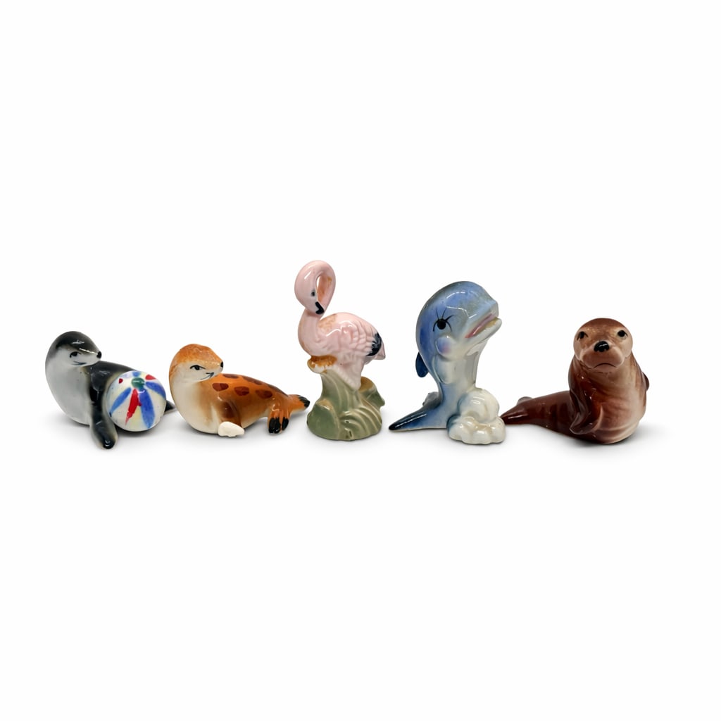 SEA LIFE Cute Miniature Hand-Painted Ceramic Figurines (set of 5): 'Miniature Sea Life Figurine Set' (5 pieces) Circa 1980-1990 Approx 2 - 3 Inches each. Five small, hand-painted, glazed ceramic mini Sea Life figurines. Blue whale, Seal w/ball, Sea Lion, Spotted Seal