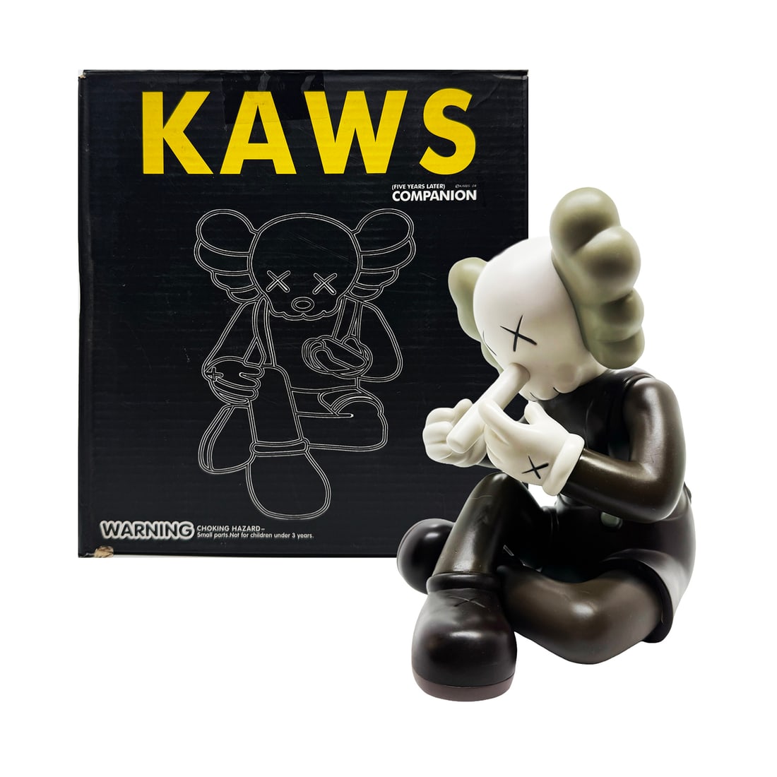 KAWS 'Small Lie - Seated' (2017) REPLICA Designer Art Figure: 'Small Lie - Seated' by KAWS (after), 2017 REPLICA Limited Edition designer art figure based on KAWS' characters. Brown variant. 8 x 7 x 5 Inches 20.3 x 17.8 x 12.7 Centimeters 9 x 8 x 6 Inches (box) 
