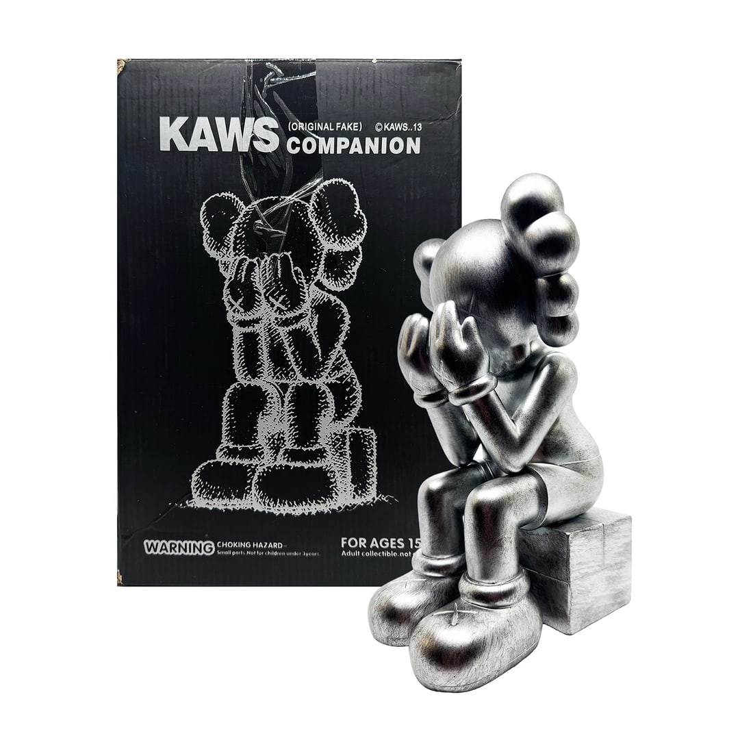 KAWS 'Passing Through' (2018) REPLICA Designer Art Figure: 'Passing Through' by KAWS (after), 2018 REPLICA Limited Edition designer art figure based on KAWS' characters. Slver variant. 11 x 6 x 7 Inches 36.8 x 16.5 x 8.9 Centimeters 12 x 7 x 8 Inches (box) Pa