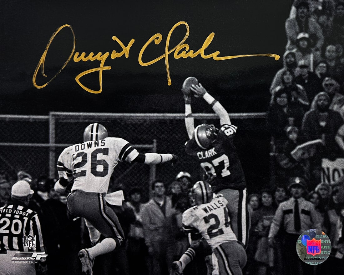 SAN FRANCISCO 49ers - DWIGHT CLARK 'The Catch' (1982) Hand-Signed b/w 8x10 Photo: ‘The Catch’ featuring Dwight Clark of the San Francisco 49ers, 1982 Iconic black-and-white photograph capturing “The Catch,” one of the most famous plays in NFL history, which sent the 49e