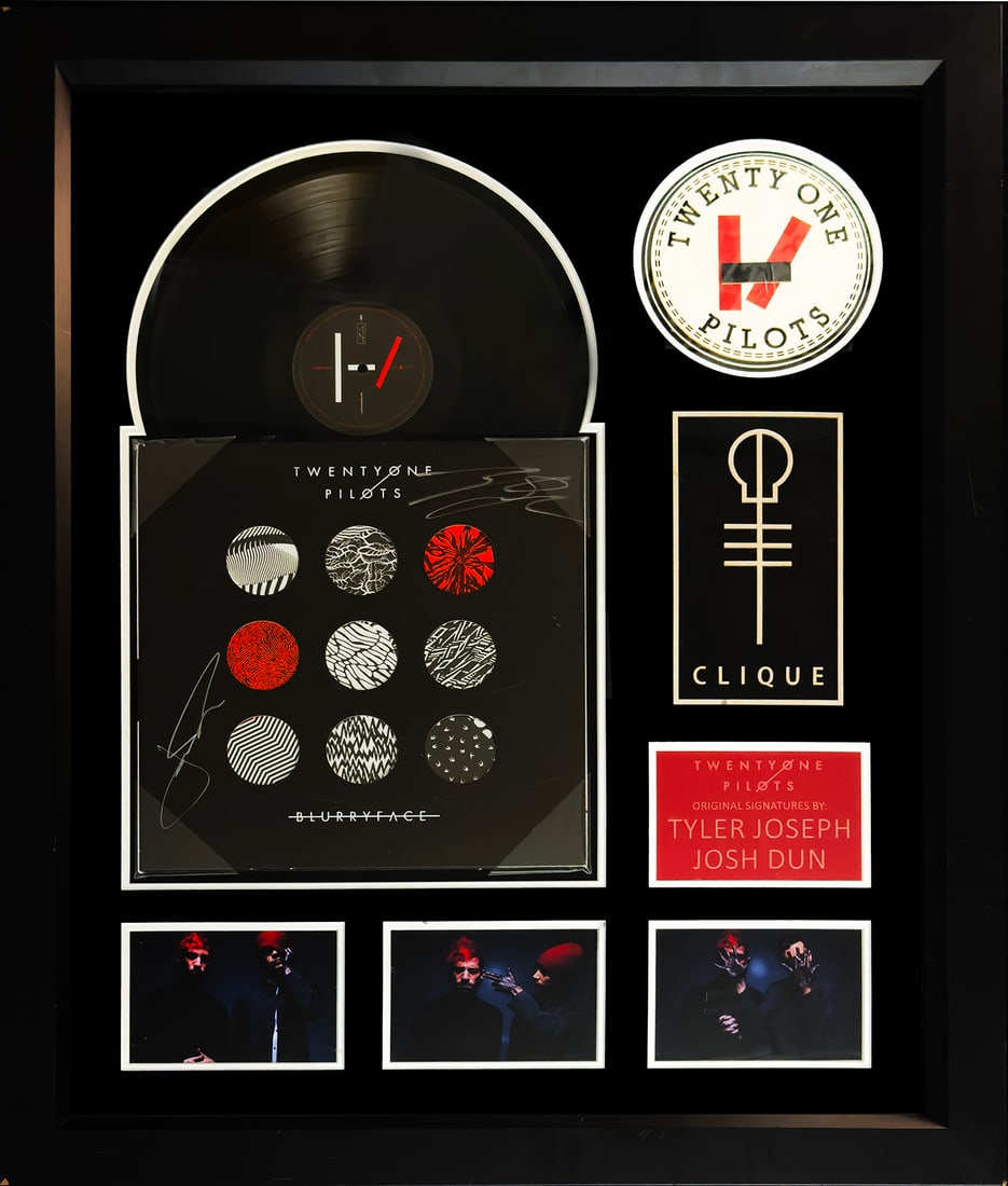 TWENTYONE PILOTS 'Blurryface' (2015) Custom Framed Vinyl Record LP: Blurryface' by Twentyone Pilots, 201512.3 x 12.3 Inches31.2 x 31.2 Centimeters33.5 x 27.5 x 2 Inches (framed)Original gatefold double-vinyl LP record album.Includes original mylar insert.Record Label: