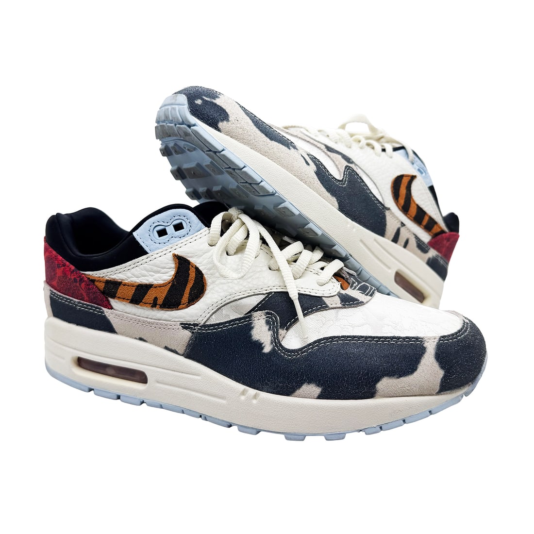 NIKE 'Air Max 1 Safari Mix' (2023) Vibrant Sky Women's Running Shoes: 'Air Max 1 SAFARI Mix' by Nike, 2023 Multiple textures and patterns, including cow-style overlays, tiger-striped Swooshes, and richly detailed heel panels. Size: 9.5 US;