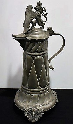 German Pewter Flagon Lion Shield c.1780: Fine German Pewter Flagon with Lion Shield ca. 1780-1800. Has Angel Legs at base, measures 15.5".