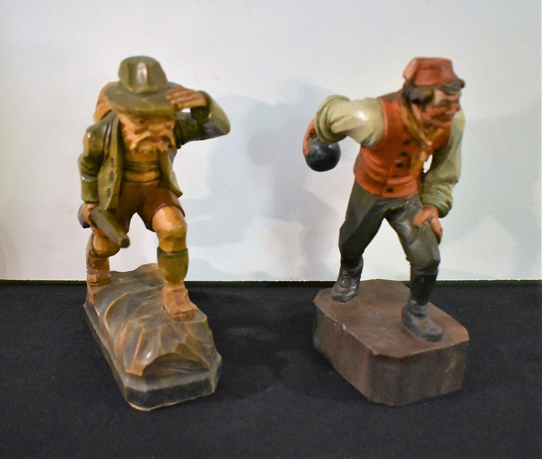 2 German Wood Carvings: A Group of 2 German Wood Carvings.