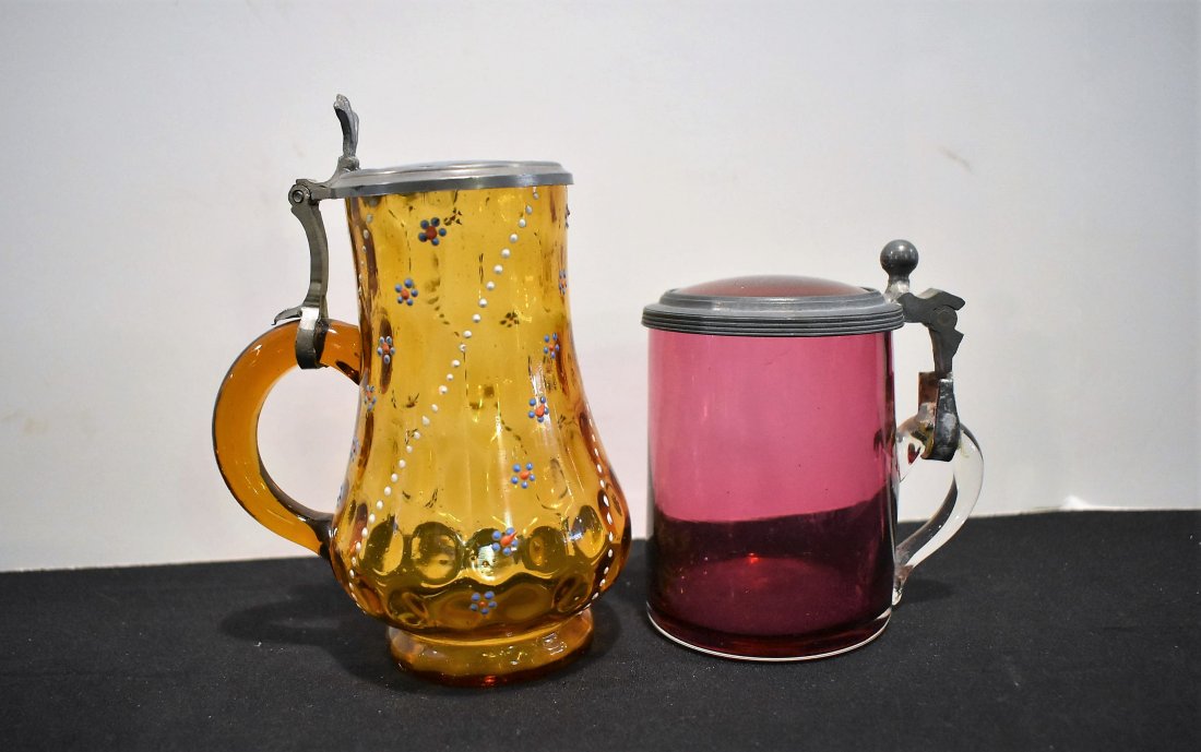 Lot of 2 Antique Hand Painted Glass Steins: Group of 2 Antique Glass Steins with Glass inlay lids, one is hand-painted. 5.5" & 3.75" tall.