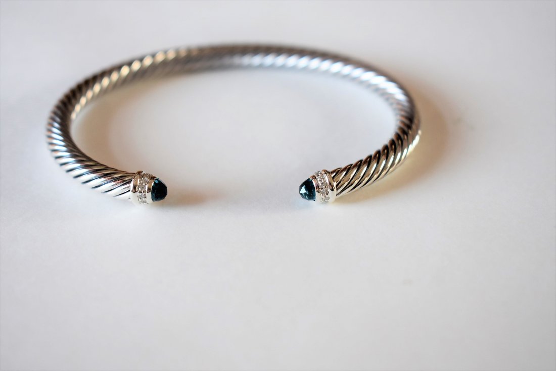 David Yurman Blue Topaz & Diamonds Cable Cuff Bracelet: David Yurman 5mm Cable Cuff Bracelet, Sterling Silver with Blue Topaz and Diamond, 7". Includes David Yurman Pouch.