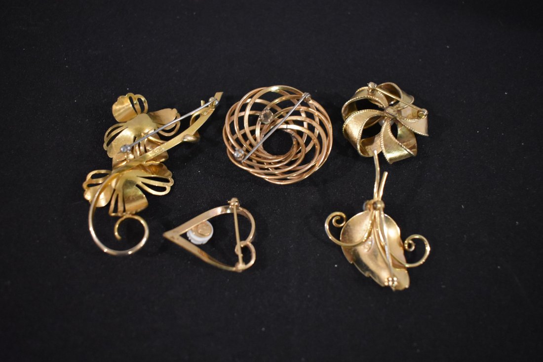 Lot of 1/20 12K Gold Filled Pins Brooches: A group of 5 1/20 12k Gold Filled Brooches/Pins, as shown.