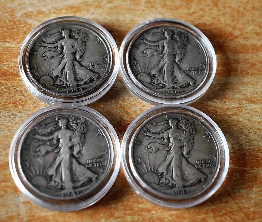 Lot of 4 Walking Liberty Half Dollars: A Group of 4 Walking Liberty Silver Half Dollars including 1934, 1940, 1941 & 1943.