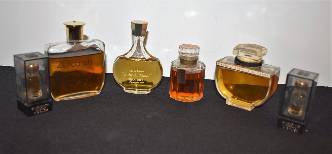 Group of 6 Vintage French Perfumes: Group of 6 Vintage French Pefumes including: L'Air du Temps, Sortilege, 20 Carats, Fleurs De rocaille De Caron, and 2 Givenchy.