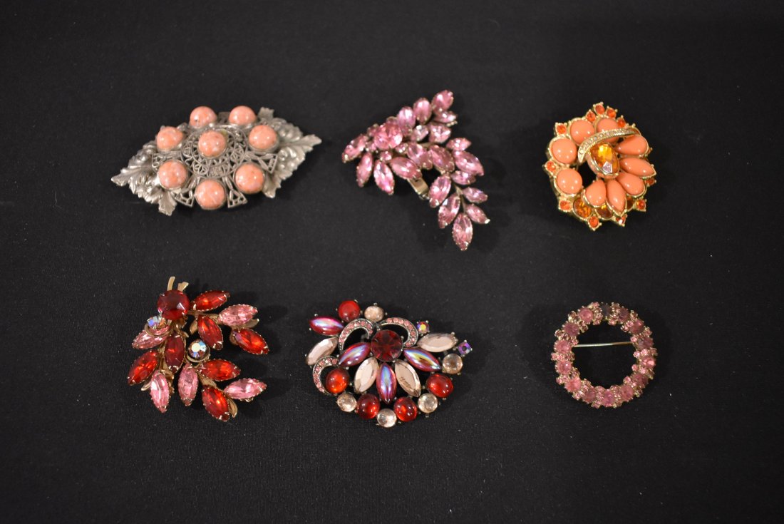 Rhinestone Brooch lot of 6 in Hues of Pink & Red: Rhinestone Brooch lot of 6 in Hues of Pink, Red, coral and even orange? one is signed ART and another signed Weiss (pink ring with one dark dirty stone)
