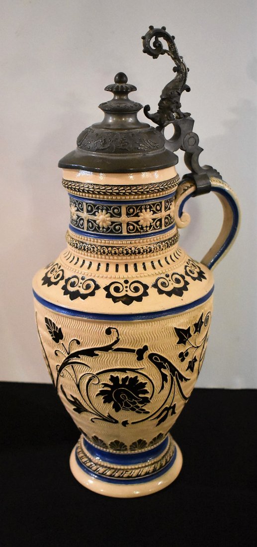 1.5 Liter Threaded Beer Stein: 1.5 liter Threaded Stein, cream color body with threaded style decoration. Marked 632 on bottom. Measures 15" tall.