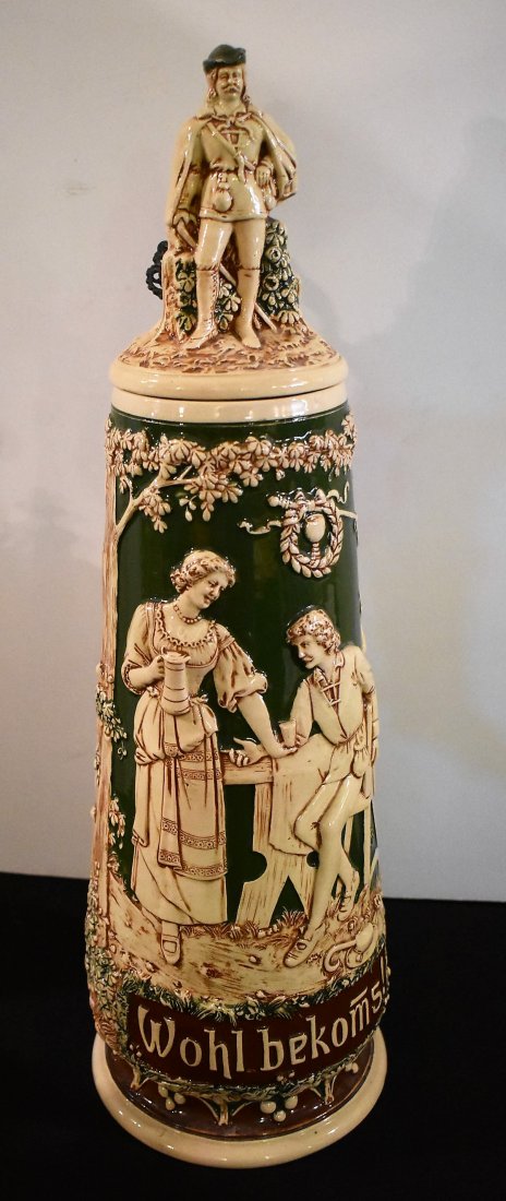 2 Liter Pottery Beer Steinn Figural Inlay: 2 Liter Drinking Scene Pottery Beer Stein with Figural Inlay of a well-to-do man. Marked Germany 195 on bottom. Measures 19.5" tall