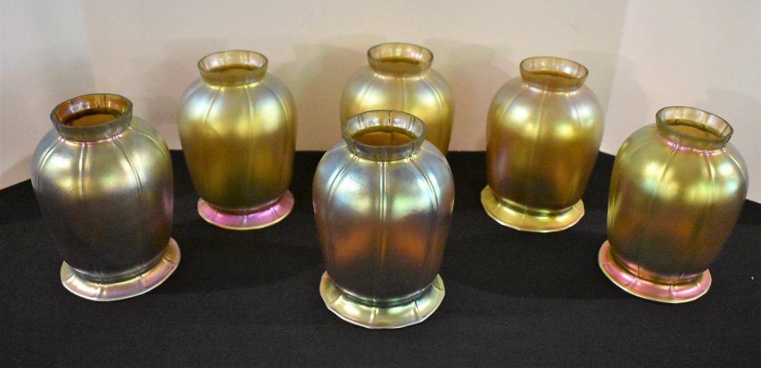 Group of 6 Vintage Stuben Lamp Shades: A Group of 6 Stuben Lamp Shades measuring 5.5" tall. Rare Color with hints of purple.
