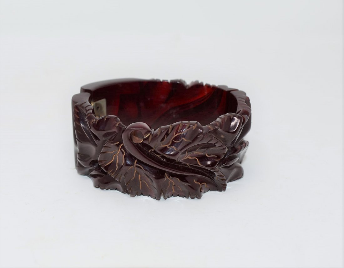 Bakelite Hinged Heavy Carved Blood Red Wine Bracelet: Here is a Rare and amazing Example of Heavy Carved Blood Red/Red Wine Bakelite Cuff Bracelet with Leaf Design and Gold Accents - in amazing shape!!! please see the pictures, this is an insanely hard p