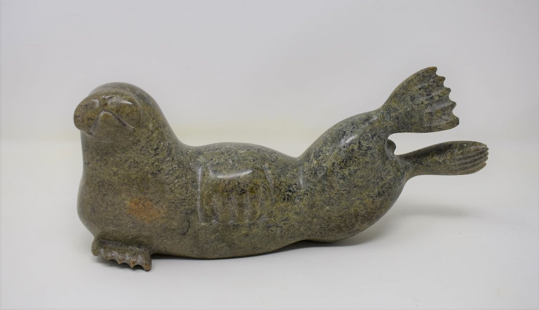 Carved Tribal Soapstone Walrus Sea Lion: Large Carved Tribal Soapstone Walrus/Sea Lion, signature is illegible, measures 11" long.