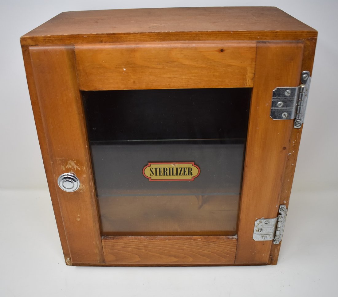 Vintage Barbershop Sterilizer: Vintage Wood Barber Shop Sterilizer, measures 13.5" x 12.5", glass door and 1 glass shelf. Nice display piece