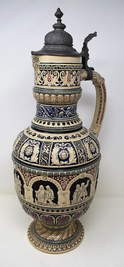 3 Liter Pottery Beer Stein: Large 3 liter pottery beer stein with pour spout and pewter lid, wrap around decorations of couples