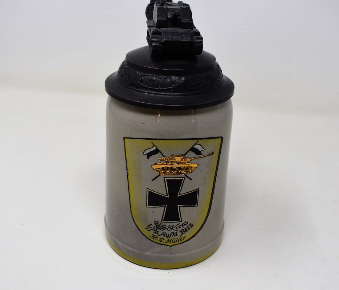WWII Military Beer Stein Tank Unit: 1/2 liter Pottery Millitary Beer Stein, marked Auffz Korps 1/Pz Aufkl Bt12, Solider H.R. Muller. Nice pewter lid with tank, measures 7" tall