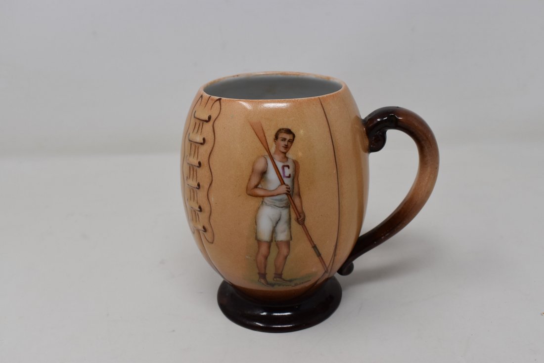 1/2 L F. Earl Christy Cornell Football Stein: A Rare Cornell Football Stein, no lid, with Cornell Rowing Decoration, marked Stillsons on backside of stein. Shows a horseshoe hairline crack around the rowing decoration, non-distracting, displays w